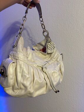 Coach Kristin Y2K shoulder bag with drawstring metallic color